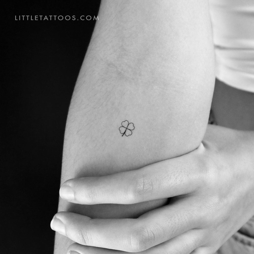 Small Black Four Leaf Clover Tattoo Idea