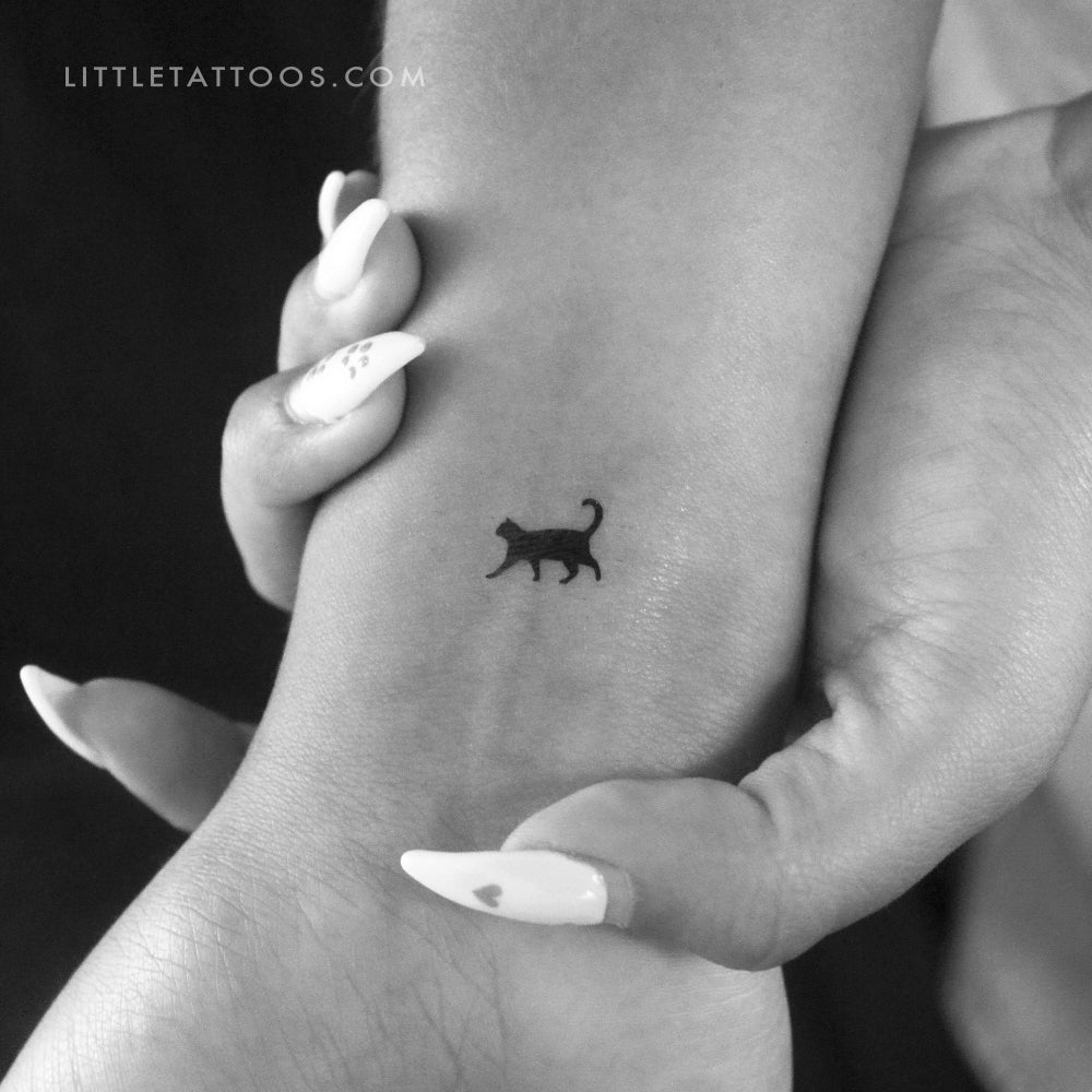 Stunning Silhouette of a Cat Tattoo Idea