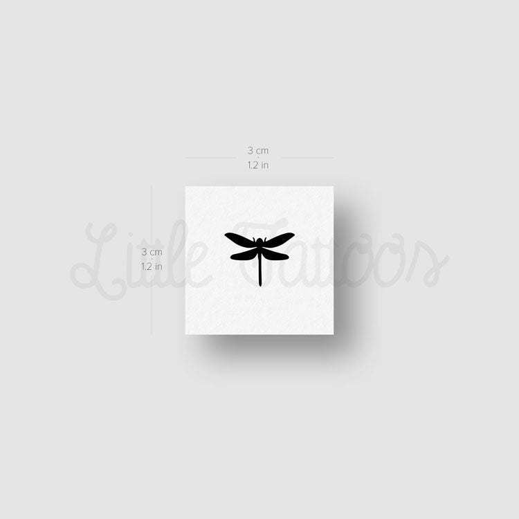simple black dragonfly tattoo