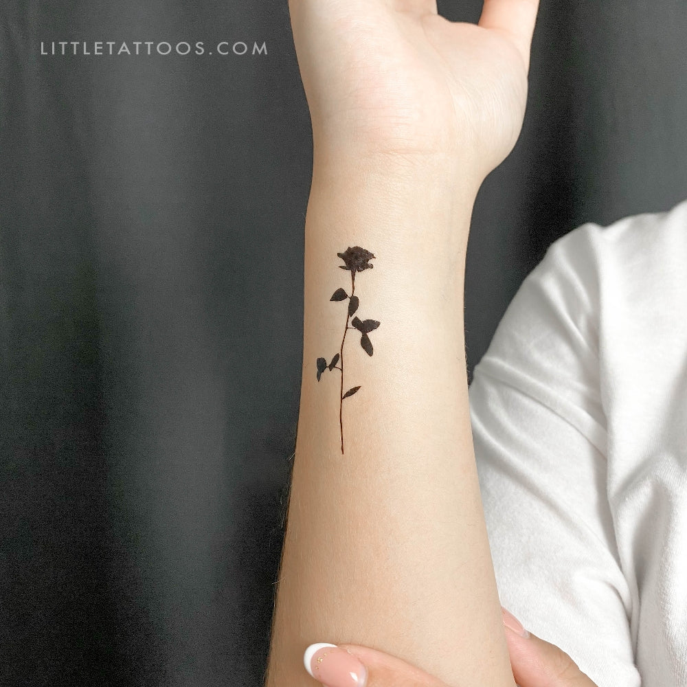 Black and White Rose Tattoo on Wrist