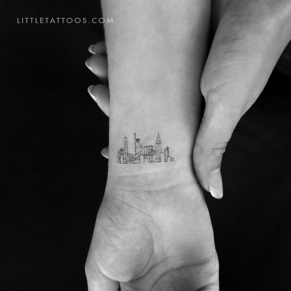 Fine line New York Skyline tattoo on the inner forearm | New york tattoo,  Skyline tattoo, Nyc skyline tattoo