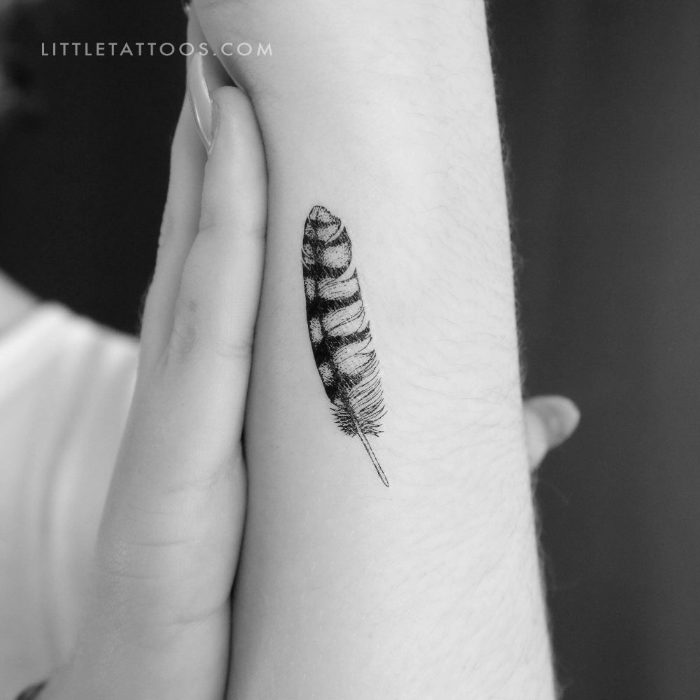 Temporary tattoo - Feather with blue thin lines.