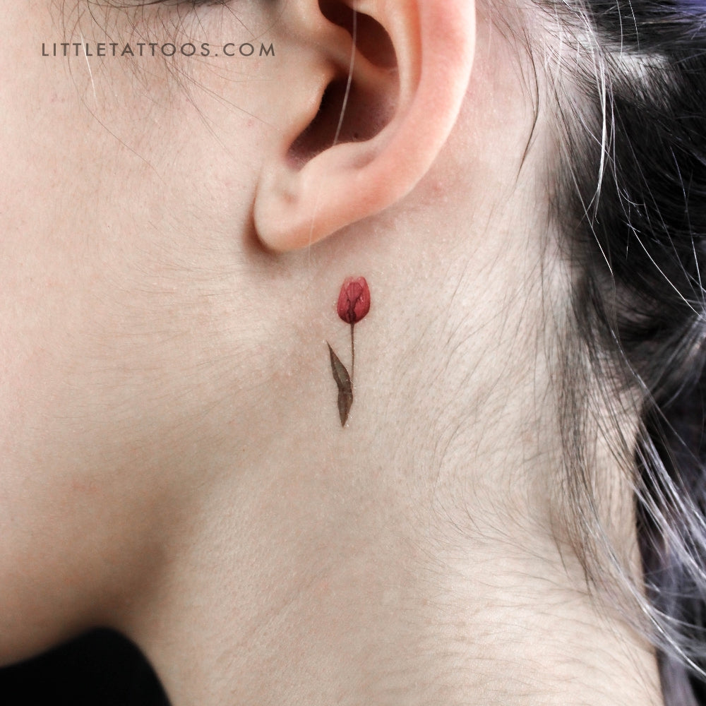 Flower Tattoo with Piercing on Ears