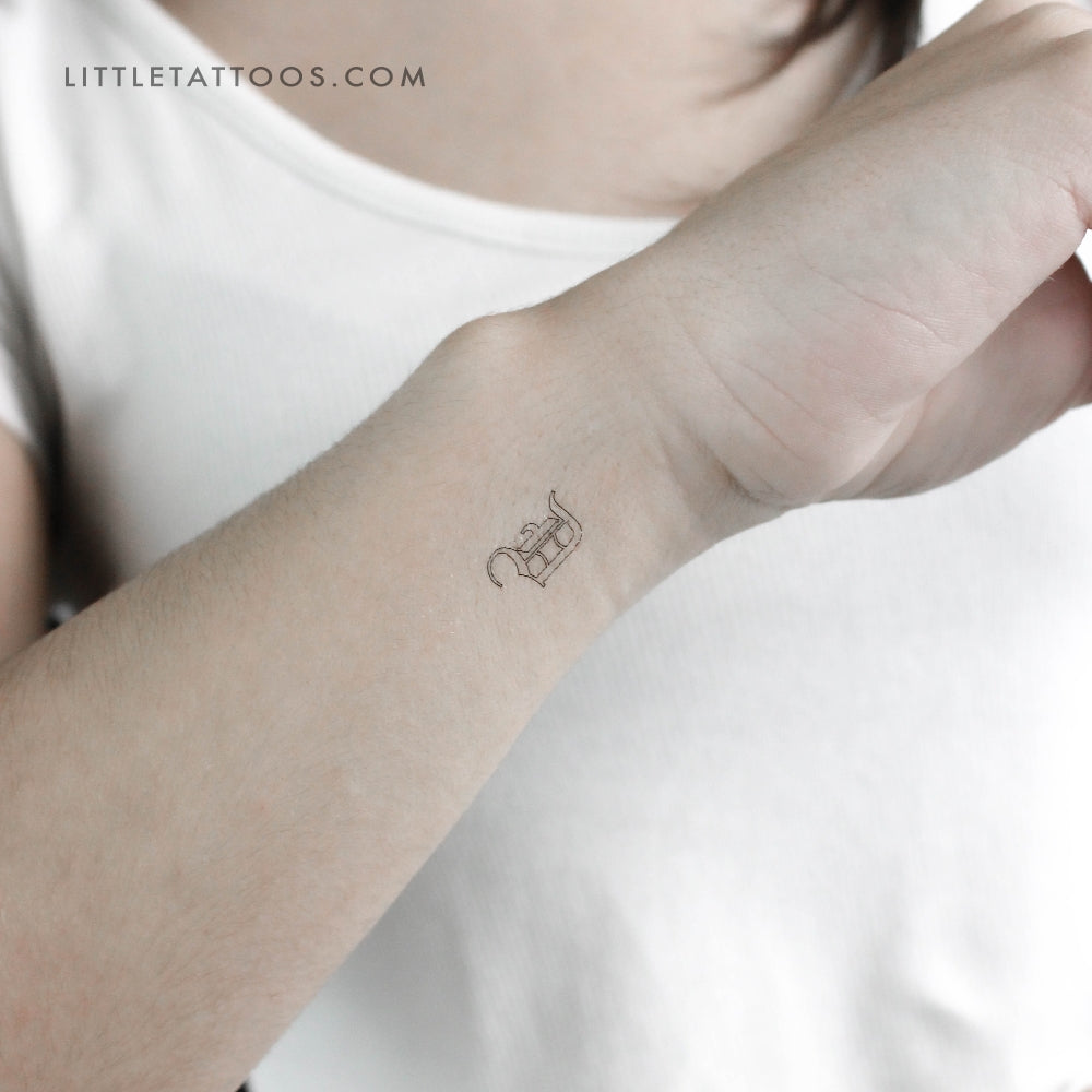 Tattoos of the Letter D in Old English Style