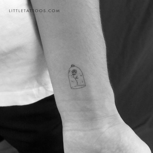 Tatuaje temporal de una pequeña rosa en una cúpula de cristal (juego de 3)
