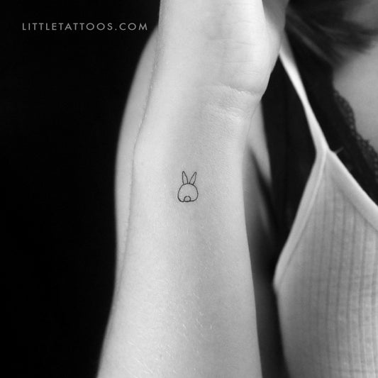 Tatuaje temporal de un pequeño conejo desde atrás (juego de 3)