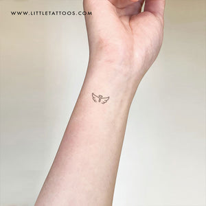 Tiny Angel Wing Tattoo  Wings tattoo, Angel wings tattoo, Wings tattoo  meaning