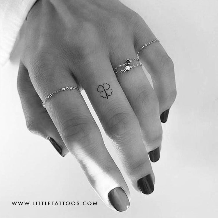 Four leaf clover tattoo on a wrist, black and grey, little, girly tattoo.  #4leafclovertattoo #wristtattoo #femimine #l… | Clover tattoos, Tattoos, Shamrock  tattoos
