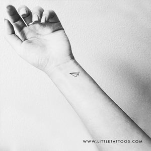 white paper airplane tattoo